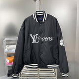 Back view of Louis Vuitton luxury clothing with label-forward styling
