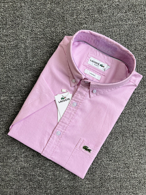 Close-up detail shot of Lacoste luxury clothing with logo-detail design