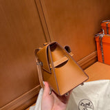 Side view of sculpted structured handbag