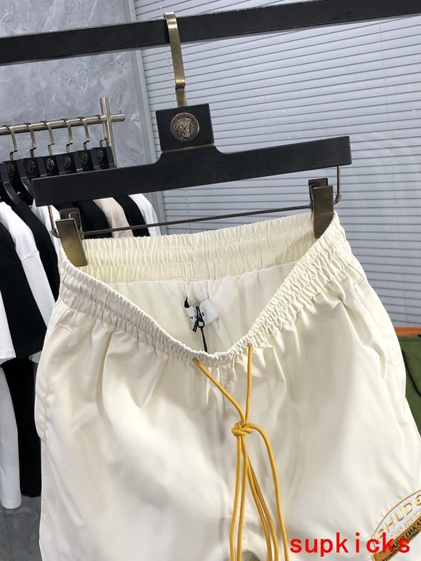 Side profile of Rhude luxury clothing with streetwear-inspired cut