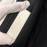 Side profile of modern refined women's handbag – women's statement bag