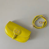Handle and strap detail of statement sleek women's handbag – women's designer-style accessory