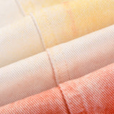 Close-up detail shot of Louis Vuitton luxury clothing with contemporary cut
