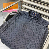 Side profile of Louis Vuitton luxury clothing with label-forward styling