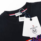Side profile of Moncler luxury clothing with logo-detail design