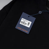 Flat lay presentation of Louis Vuitton luxury clothing with everyday silhouette
