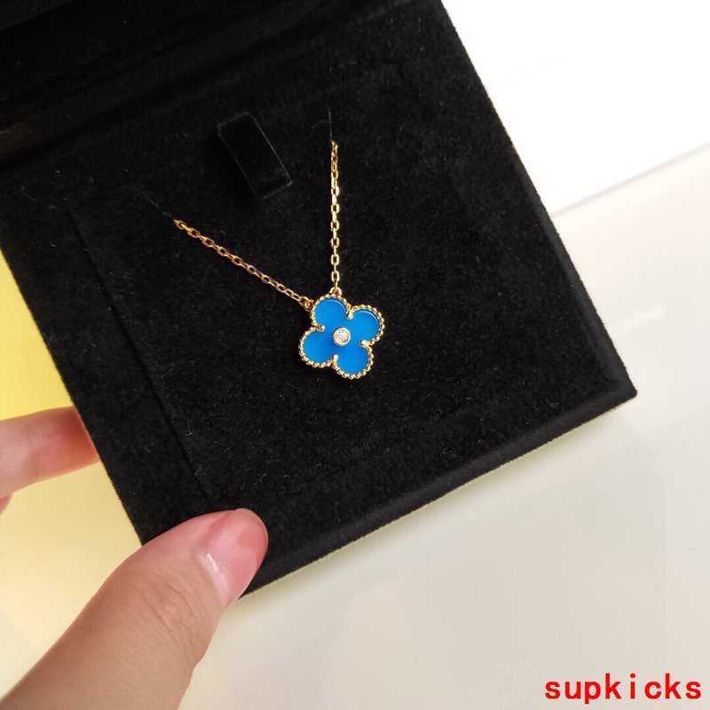 Lifestyle view of Van Cleef & Arpels unisex jewelry piece