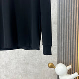 Back view of Louis Vuitton luxury clothing with monogram-inspired silhouette