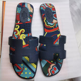 Hermes sandals Style 023 - logo and branding close-up