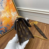 Styled lifestyle shot of structured everyday-luxe women's handbag – women's luxury handbag