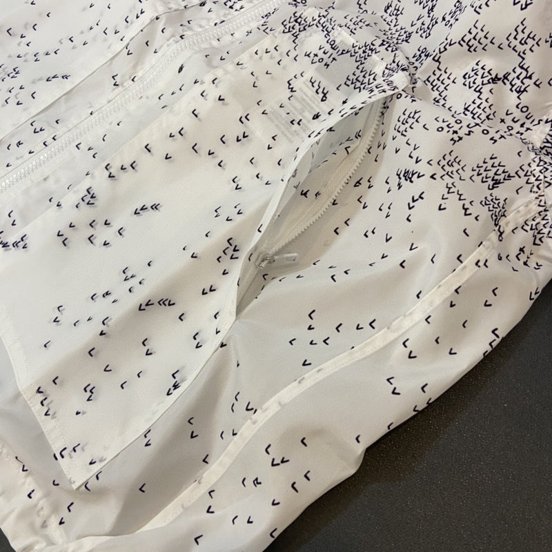 Flat lay presentation of Louis Vuitton luxury clothing with streetwear-inspired cut