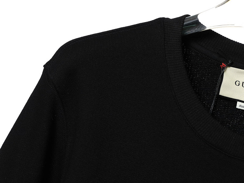 Back view of Gucci luxury clothing with tailored silhouette