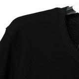 Back view of Gucci luxury clothing with tailored silhouette