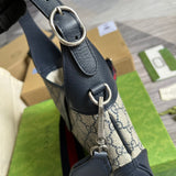 Styled lifestyle shot of premium signature women's handbag – women's luxury handbag