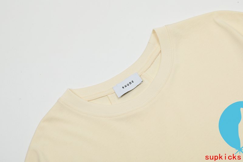 Close-up detail shot of Rhude luxury clothing with tailored silhouette