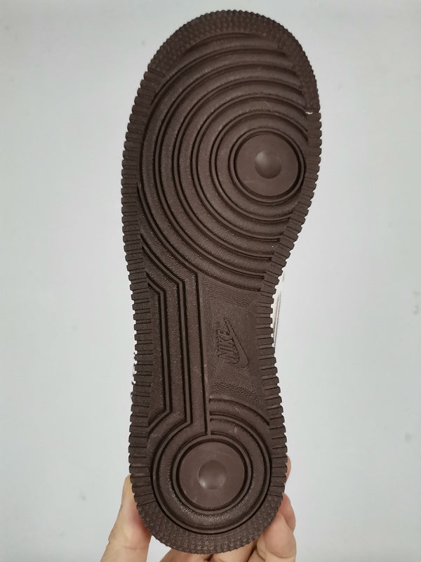 Side profile of Nike muted earth tones sneakers cushioned comfort fit
