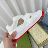 Side profile of Gucci neutral cream sneakers signature lace-up style