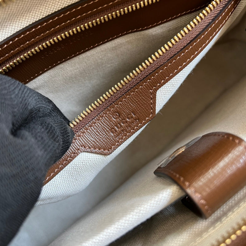 Close-up detail of sleek everyday-luxe women's handbag – women's everyday handbag