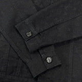 Close-up detail shot of Louis Vuitton luxury clothing with relaxed-fit cut