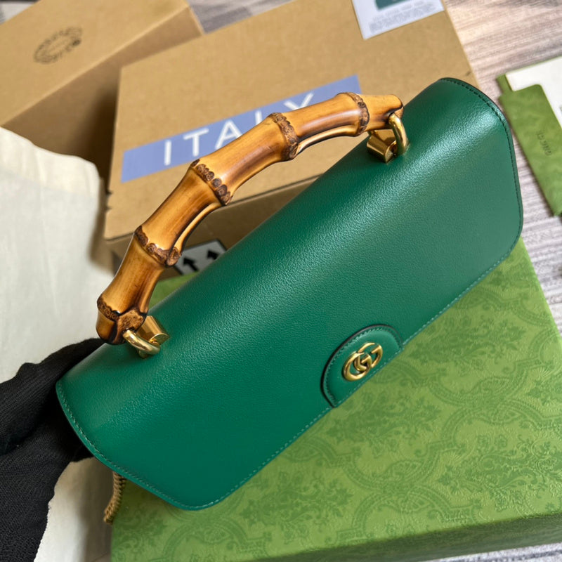 Handle and strap detail of polished elevated women's handbag – women's luxury handbag