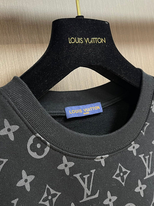 Close-up detail shot of Louis Vuitton luxury clothing with relaxed-fit cut