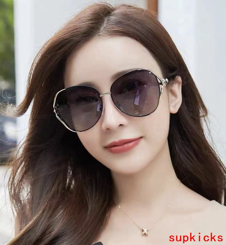 Close-up detail view of Cartier unisex sunglasses
