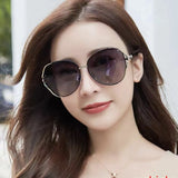 Close-up detail view of Cartier unisex sunglasses
