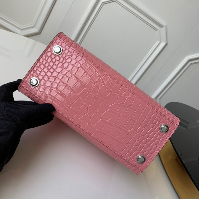 Styled lifestyle shot of modern elevated women's handbag – women's designer-style accessory