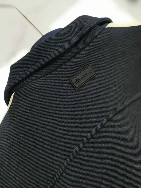 Back view of Louis Vuitton luxury clothing with tailored silhouette