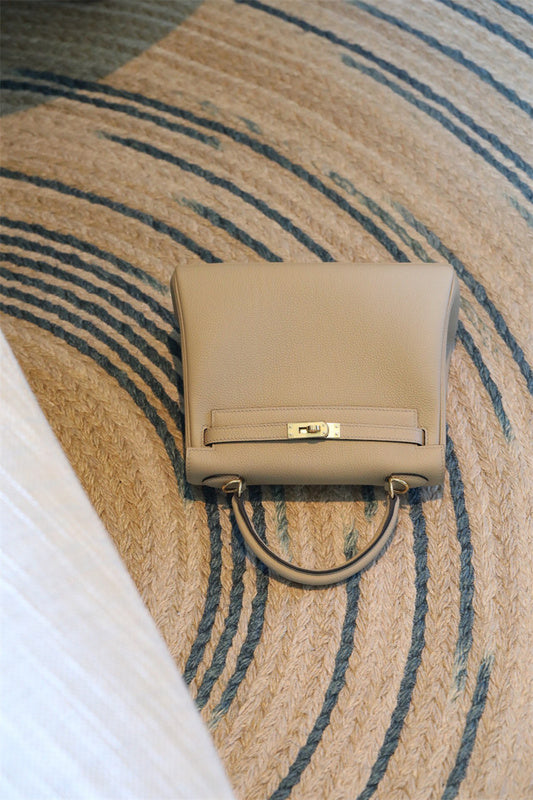 Side view of streamlined structured handbag