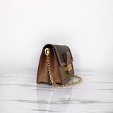 Styled lifestyle shot of modern signature women's handbag – women's designer-style accessory