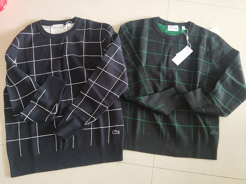 Side profile of Lacoste luxury clothing with signature branding