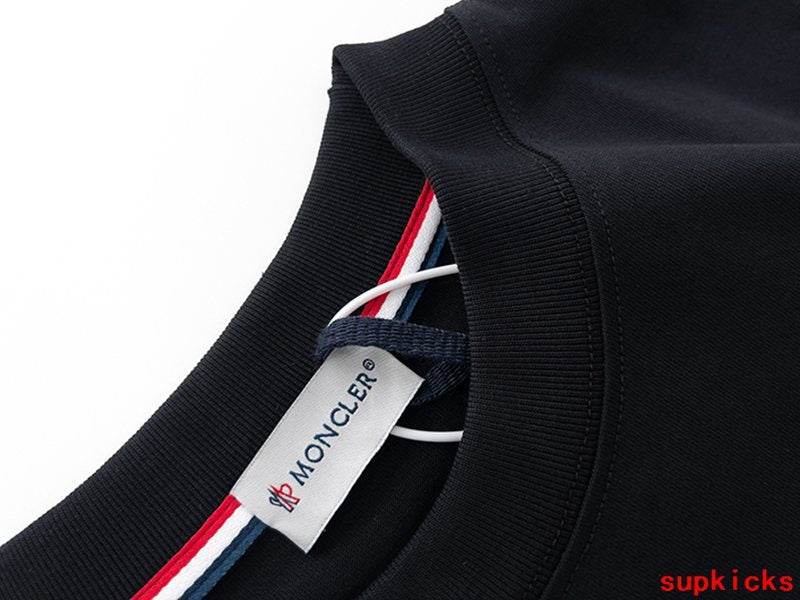 Full styled look of Moncler luxury clothing with everyday silhouette