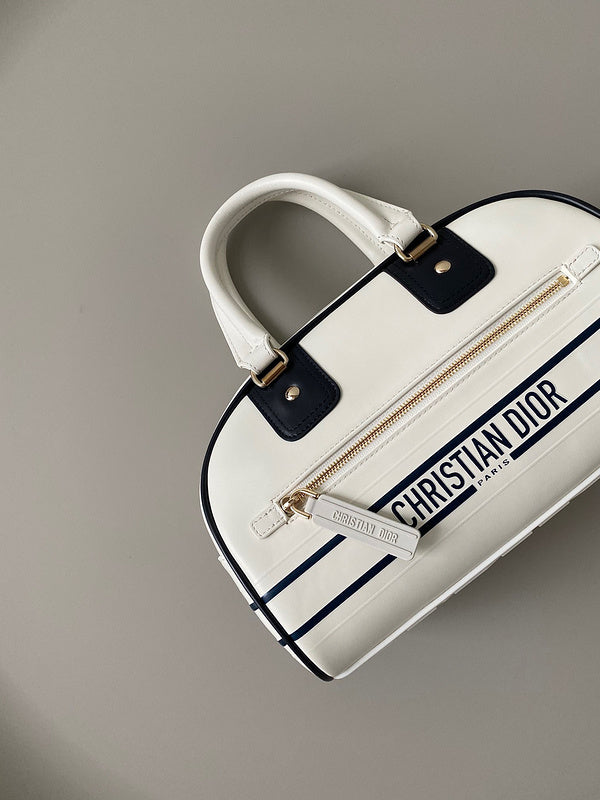 Close-up detail of signature everyday-luxe women's handbag – women's designer-style accessory