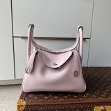  graceful top-handle bag styled with outfit 24
