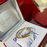 Angled view of Cartier unisex jewelry piece