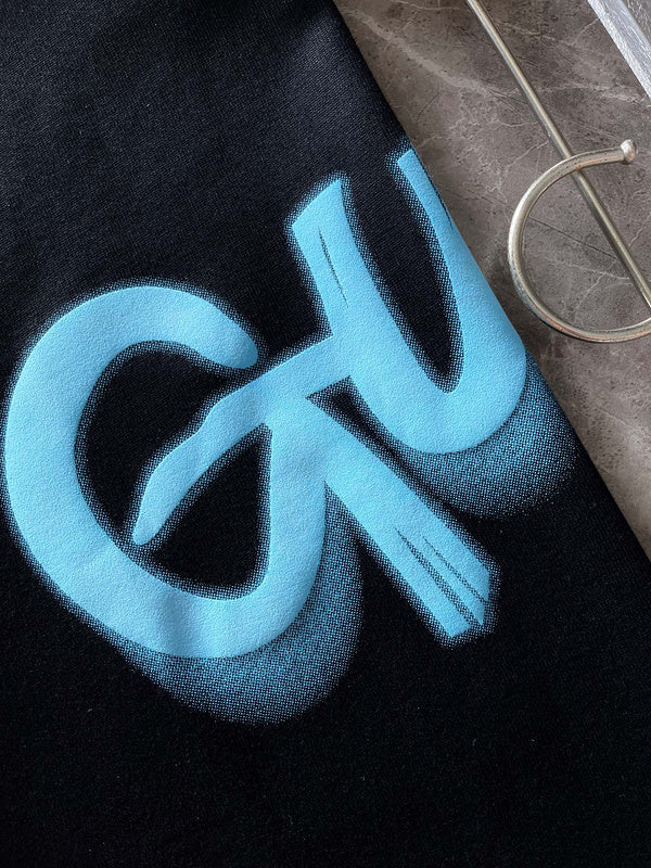 Back view of Gucci luxury clothing with monogram-inspired silhouette