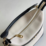 Handle and strap detail of everyday-luxe modern women's handbag – women's luxury accessory