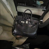 Side view of crisp structured handbag