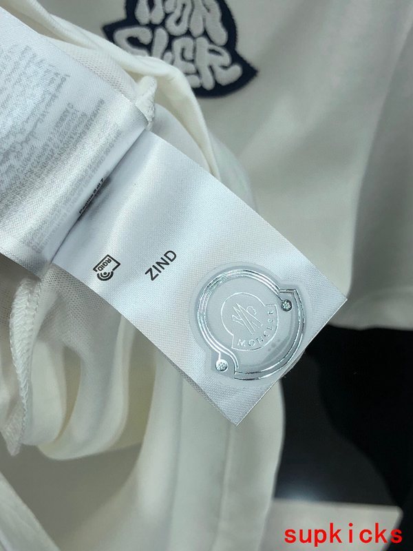 Side profile of Moncler luxury clothing with relaxed-fit cut
