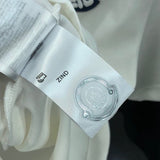 Side profile of Moncler luxury clothing with relaxed-fit cut