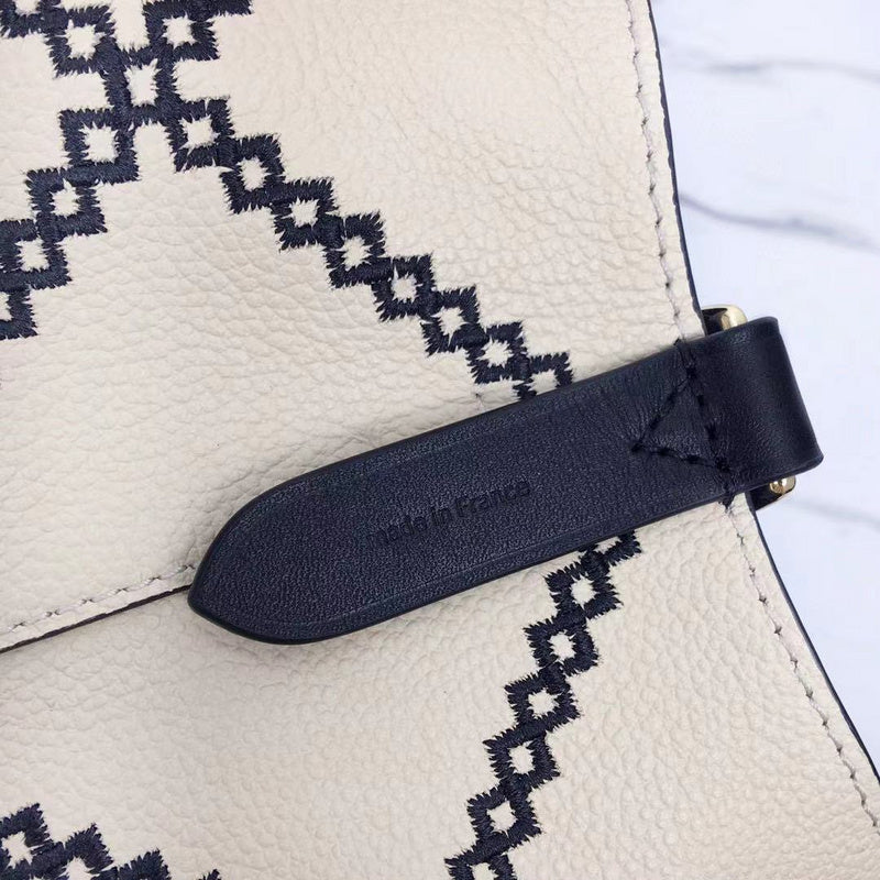 Back view of structured refined women's handbag – women's luxury handbag