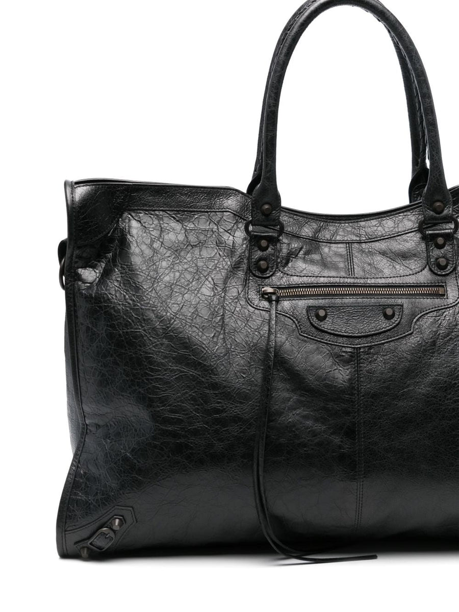 Close-up of Balenciaga handbags hardware and fine stitching