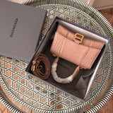 Front view of polished elevated women's handbag – women's luxury accessory