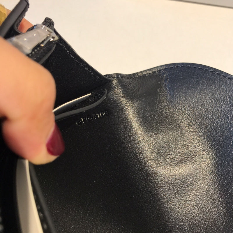 Back view of premium polished women's handbag – women's designer-style accessory