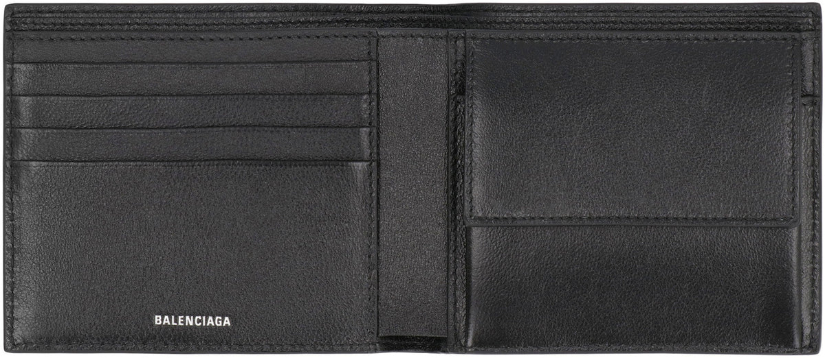 Close-up of Balenciaga small leather goods hardware and fine stitching