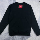 Side profile of Gucci luxury clothing with signature branding