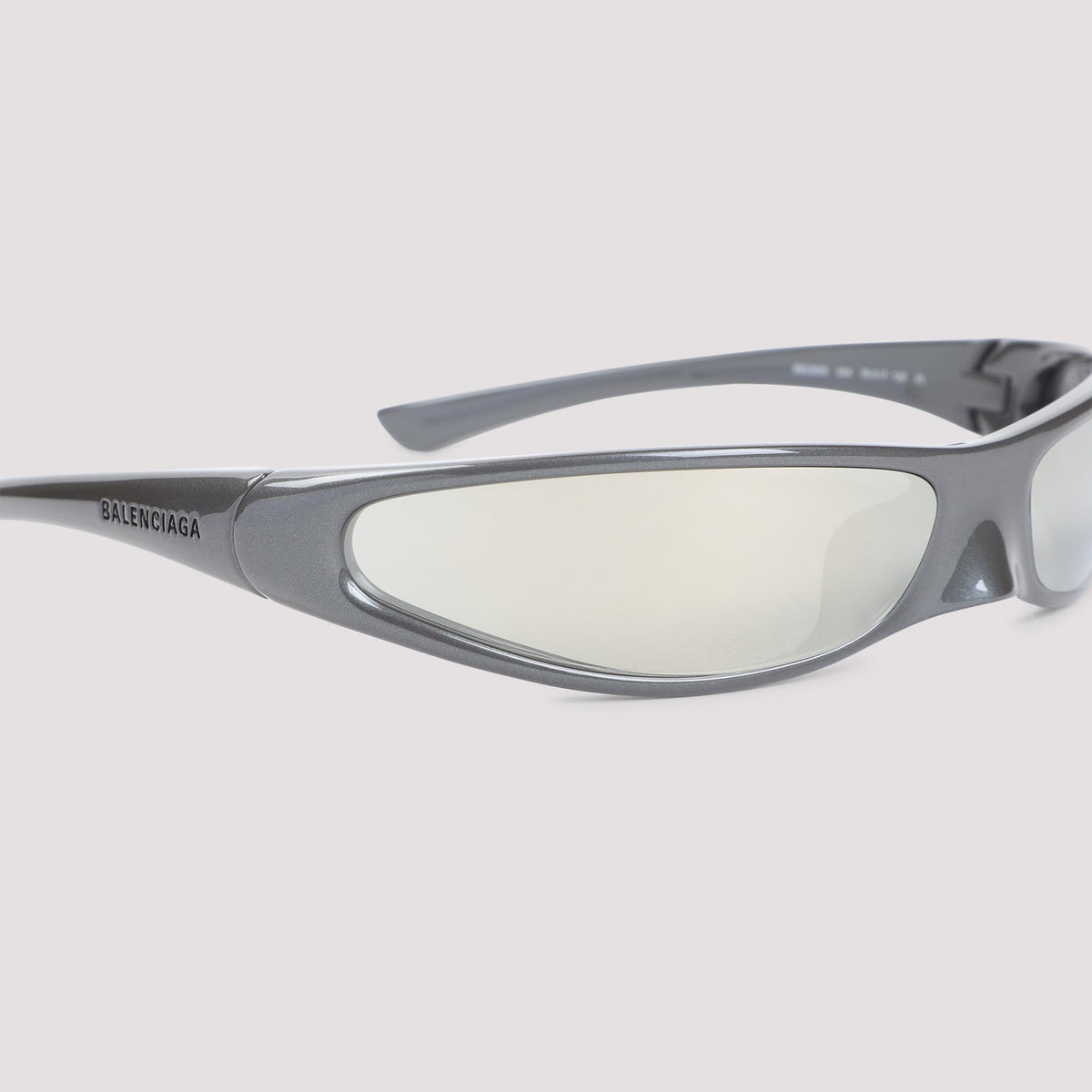 Close-up of Balenciaga sunglasses hardware and fine stitching