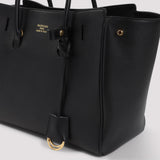 Close-up of Balenciaga shopping bags hardware and fine stitching