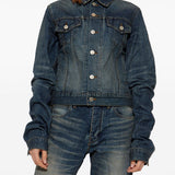 Close-up of Balenciaga outerwear hardware and fine stitching